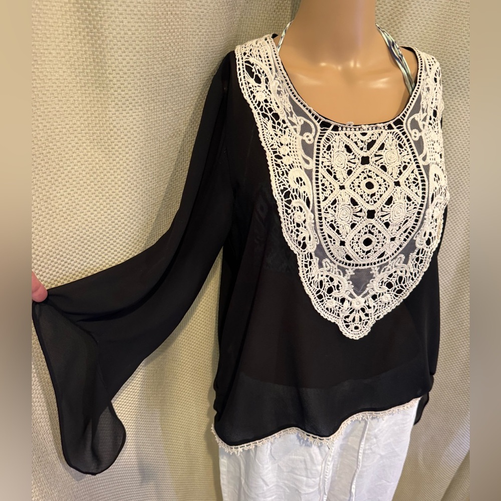 PPP 21” length 27” at the back front length 24 inches gorgeous black blouse